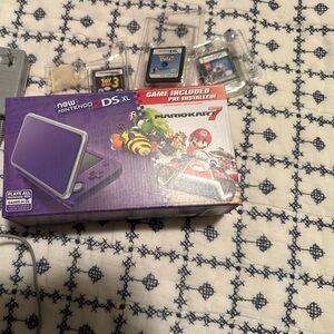 Nintendo 2DS XL in Purple with Mario Kart 7